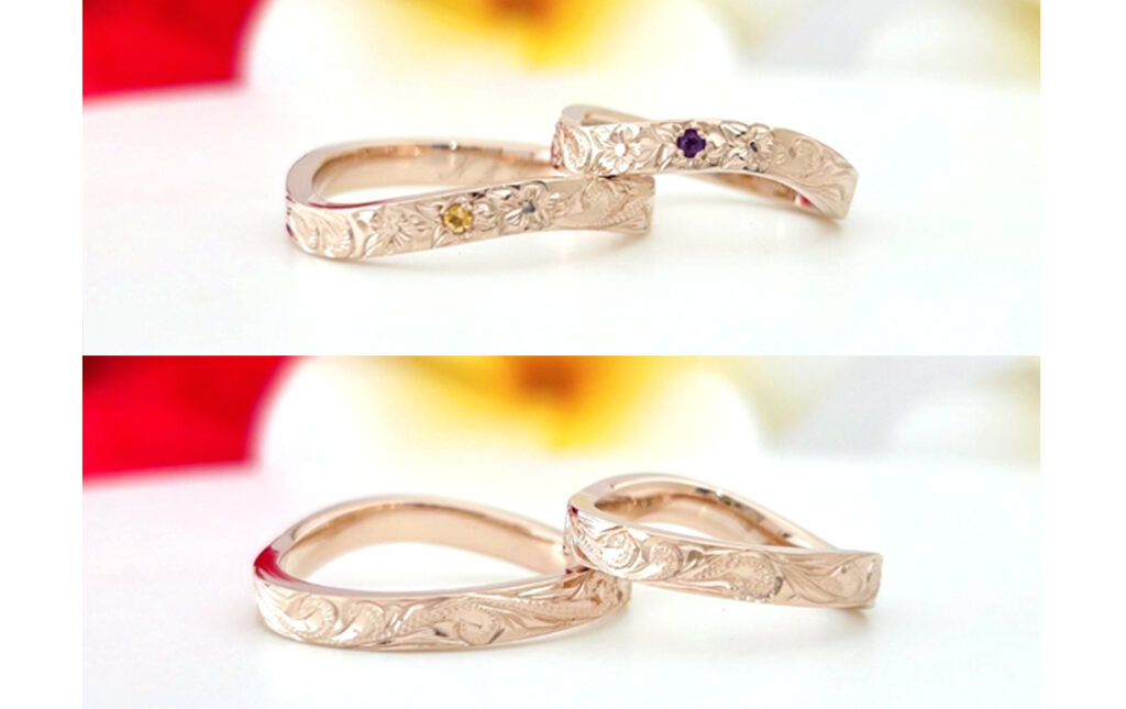  
ハワイ伝統の手彫りのデザインには、絶え間なく幸せを運び込む永遠の象徴とされている波のデザイン「プリンセス」をベースに、魅力を高める魔除けの花とされる「プルメリア」をポイント彫りとして3つ並べて華やかに。
また、中央のプルメリアに配置されたお互いの誕生石を交換した天然石のシトリンとアメジストが一際輝きを放ちます。
 
マイレ専属のハワイの熟練の彫師・Lynnによる繊細ながらも力強い手彫りの中に、お二人をあたたかく見る守護石の誕生石が煌めくとっても素敵なデザインとなりました＾＾
 
いつもとても仲良しなおふたりにぴったり！
世界でふたりだけのこだわりを詰め込んだ特別なご結婚指輪が完成いたしました！
